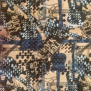 Rock And Roll Fabric Brand New. Great for DIY projects. Sold by the Yard.